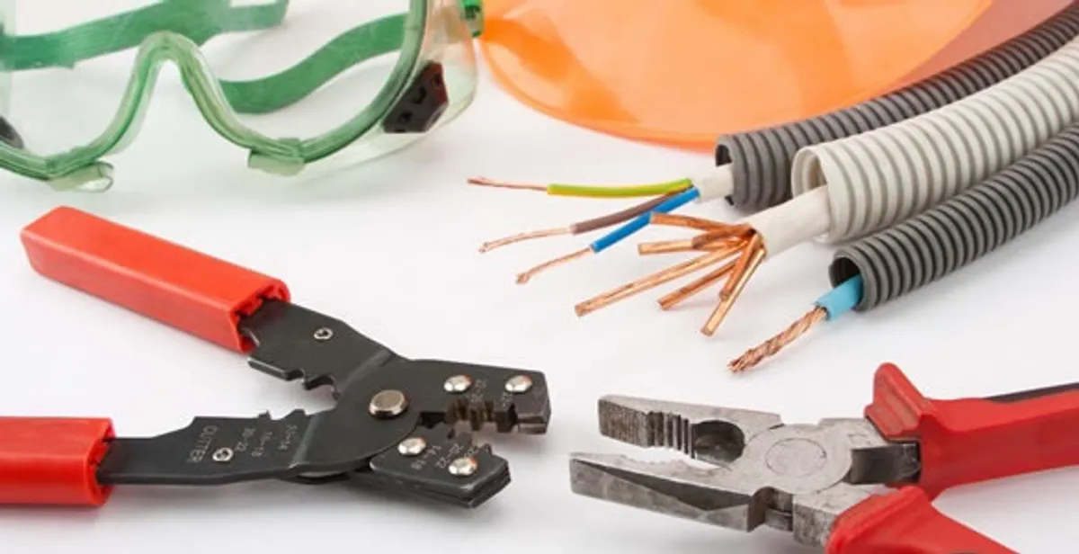 Electrical wiring repair with professional tools and safety equipment in Bellaire, TX
