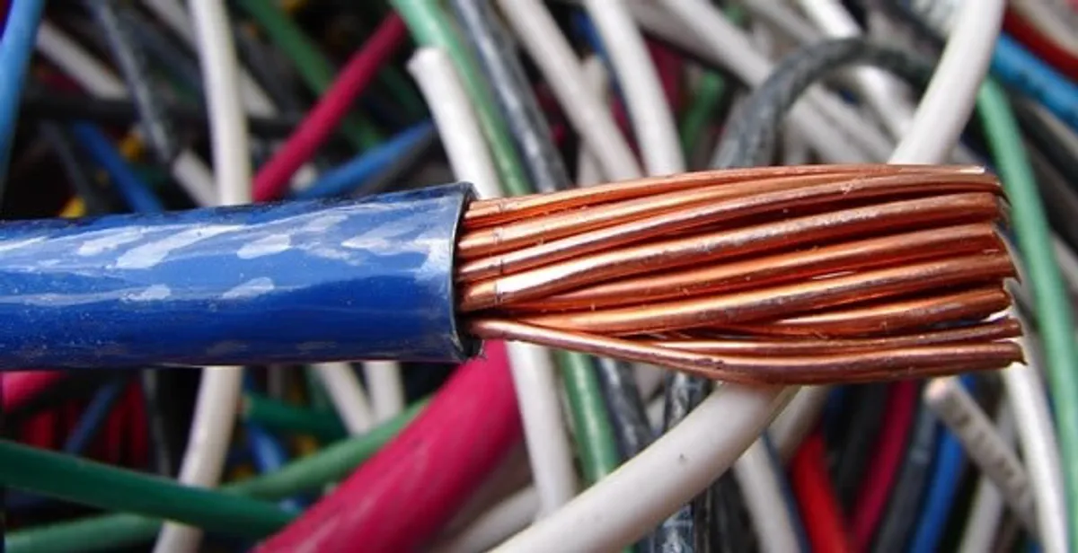 electrical wiring services showing exposed copper conductors and cable preparation in Houston, TX