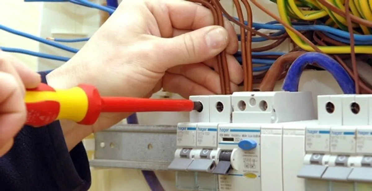 electrician services performing professional electrical panel wiring and connections in Houston, TX