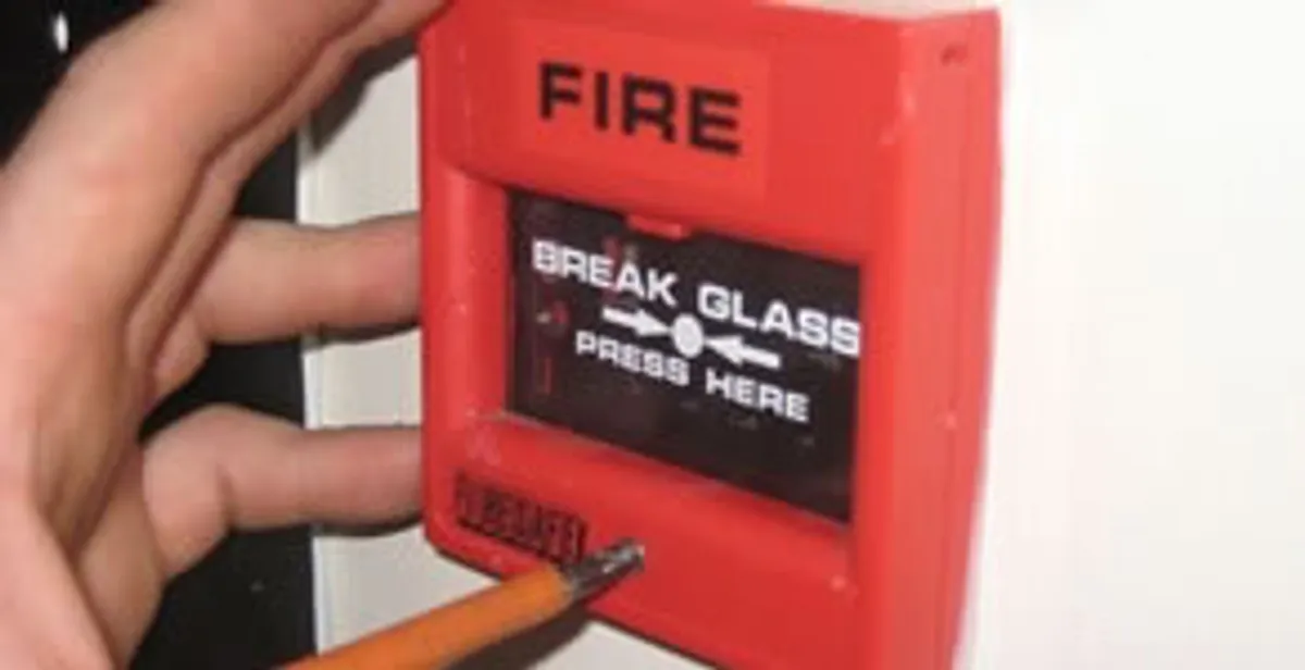fire alarm installation service showing manual fire alarm pull station installed by licensed electricians in Houston, TX