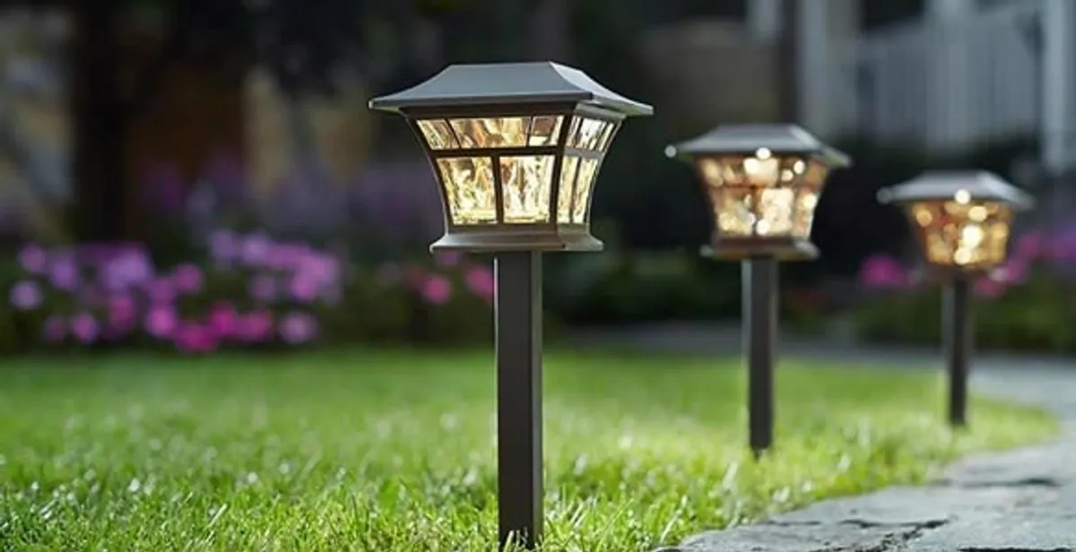 landscape lighting installation services with professionally installed pathway lights in Houston, TX